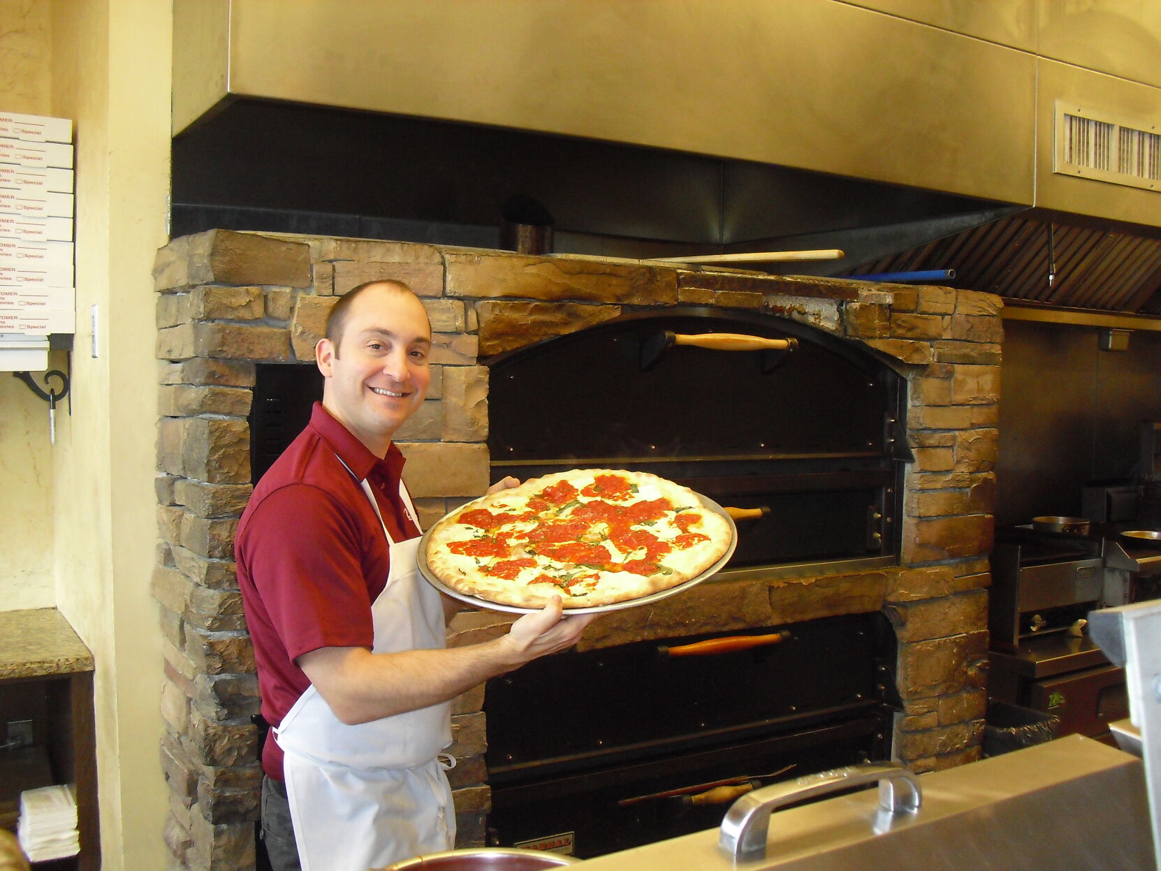 Mangia Brick Oven owner cooks up a taste of home