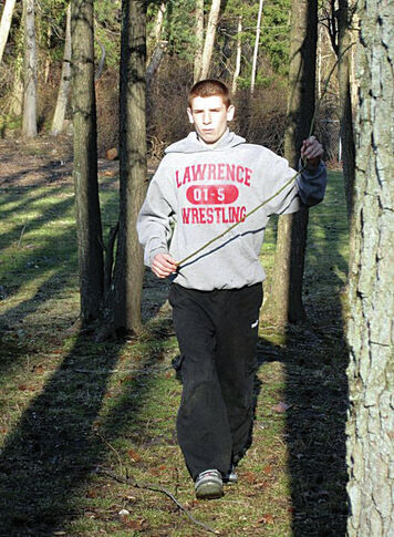 Wrestler’s junior season sets Lawrence school record