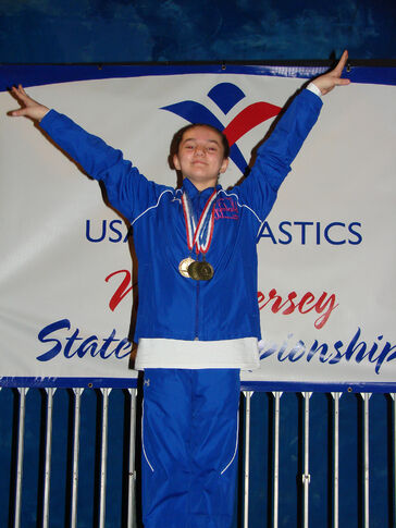 web1_2013-05-Gymnatics-State-Champ.jpg