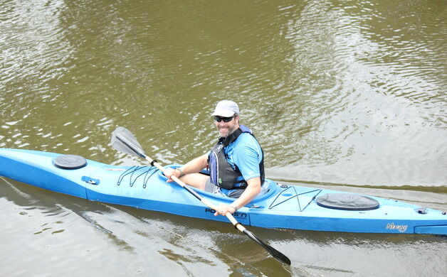 Kayakers make ‘Green Wave’ at Bordentown Beach