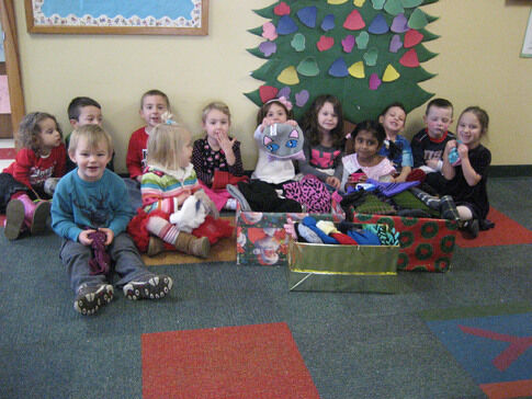 web1_2014-01-EO-Nursery-School-Mitten-Donation.jpg