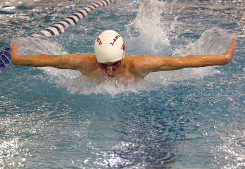 Lawrence High student trades skiing for swimming success