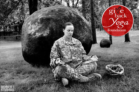 web1_MYT-for-Vets-Give-Back-Foundation-Female-soldier-meditating.jpg
