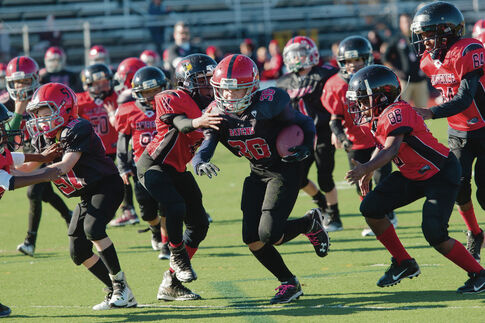 Junior Ravens football team proves looks can be deceiving