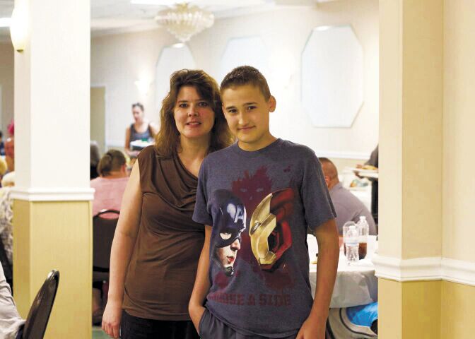 Community raises thousands to help family pay medical bills