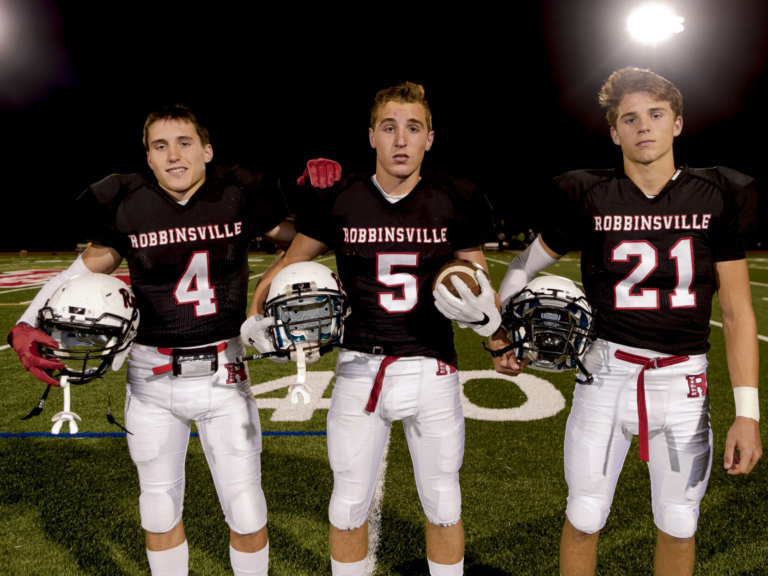 Triplets combine distinct abilities to lead Ravens football