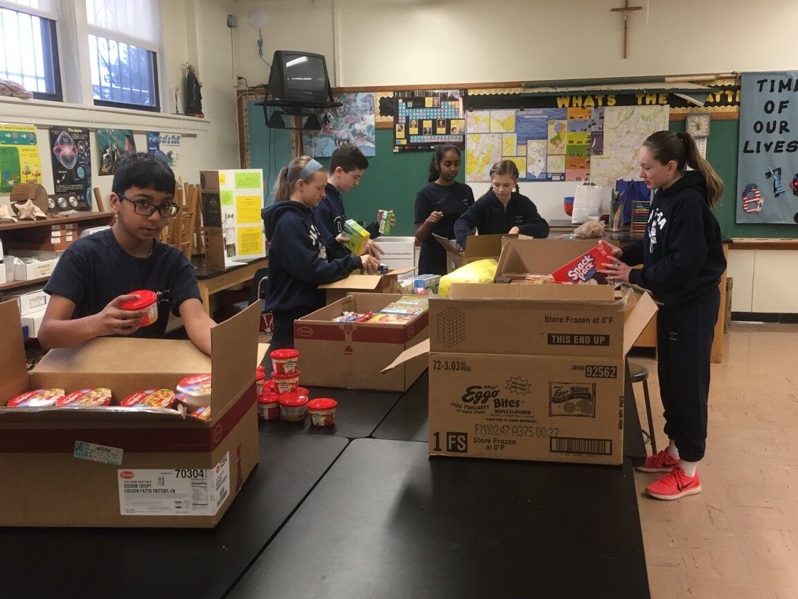 Hamilton YMCA togetherhood committee sends hunger packing