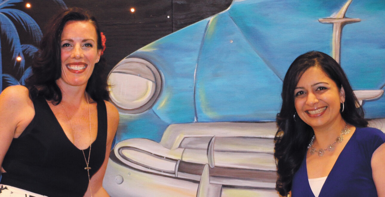 2017 04-11 WWP Arts Council vols Jennifer Connaughton (left) and Hetal Mistry (right) at WWAC’s gala fundraiser in 2016.