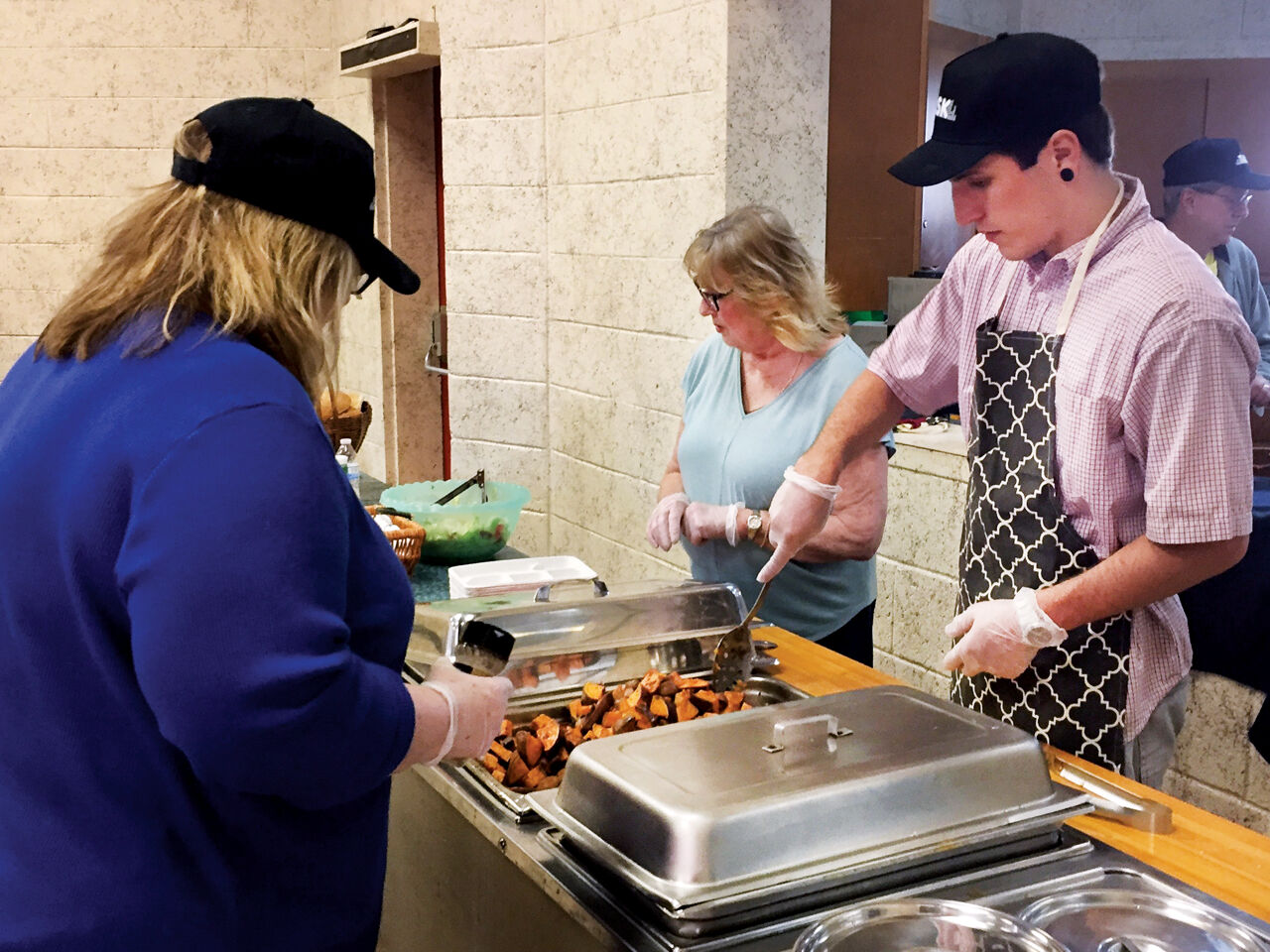 Trinity and Muslims Against Hunger team up to feed needy