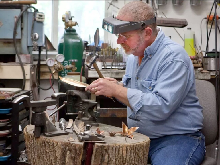 Rising from the ashes: after studio burns down, artist comes to Lawrence