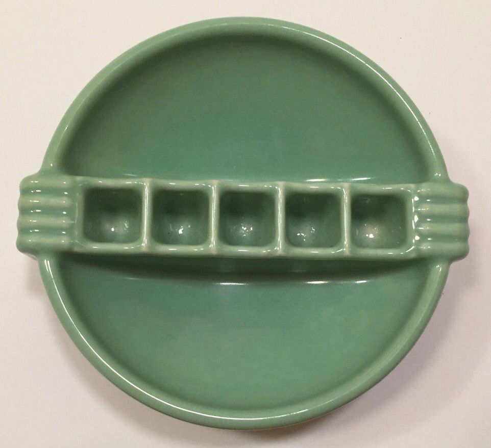 A National Porcelain Company Snuf-A-Rette Ashtray in a recent ebay ad.