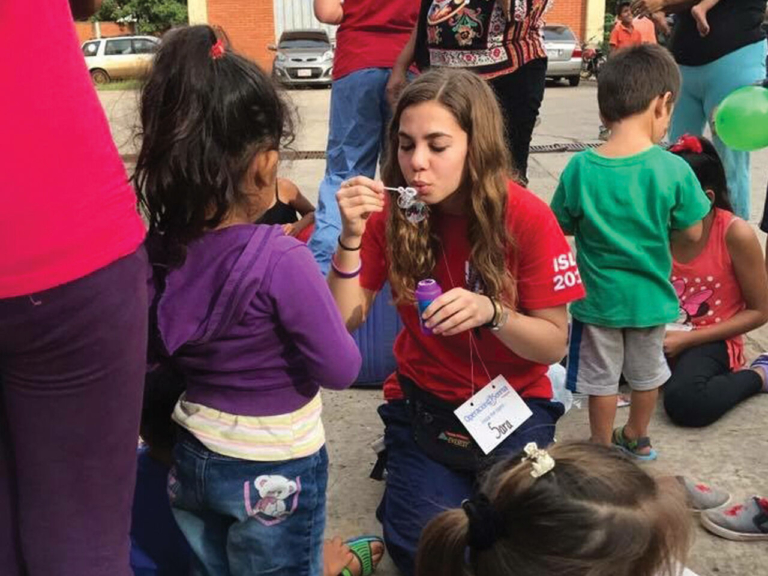 Lawrence High School grad Sara Hatfield attends Operation Smile conference