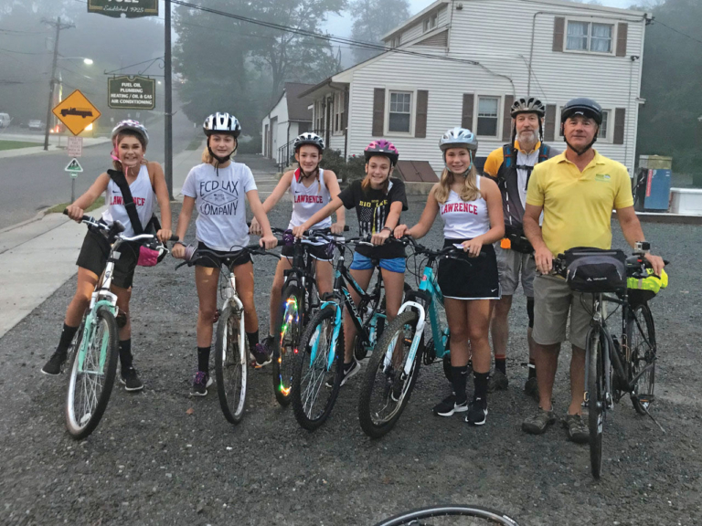 Girl Scouts analyze bike safety along Lawrence Hopewell Trail