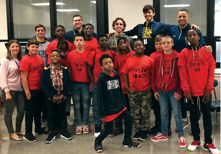 Mentoring program connects TCNJ, Fisher Middle School students