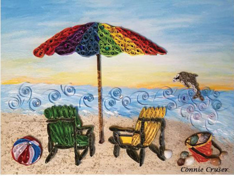 Hamilton artist Connie Cruser works on display at Ewing town hall