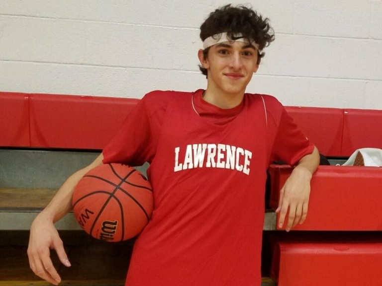 Johnson overcomes injury to help lead Lawrence basketball