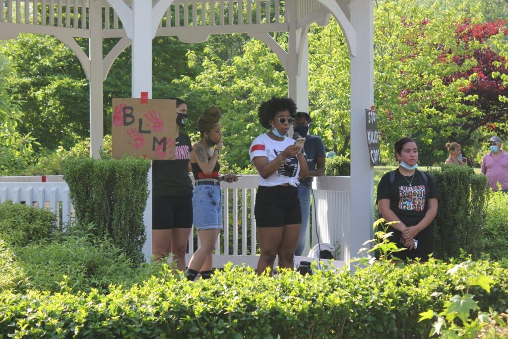 Protesters march down Route 33 at Hamilton Township rally