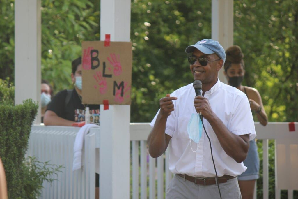 Protesters march down Route 33 at Hamilton Township rally