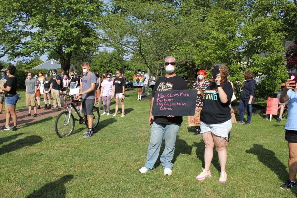 Protesters march down Route 33 at Hamilton Township rally