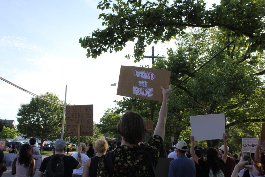 Protesters march down Route 33 at Hamilton Township rally