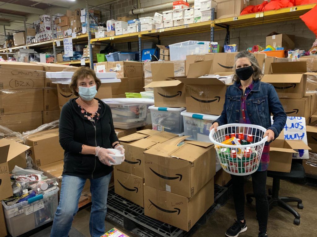 Madeline and Alyssa_WW and Princeton_volunteers_warehouse