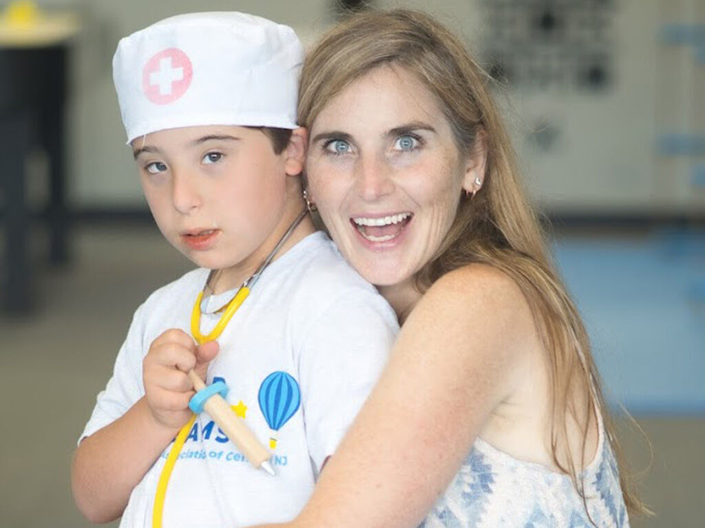 Melissa Burgos and her son Lee at the Club Dreams grand opening