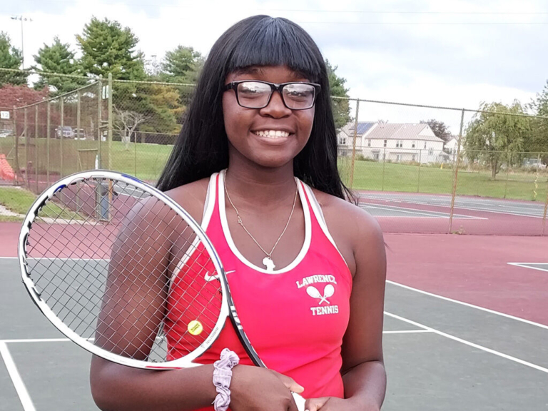 Leticia  Kitio takes first-ever MCT singles title for Lawrence High School