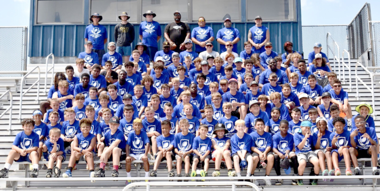 In-season rivals make summertime friends at football camp