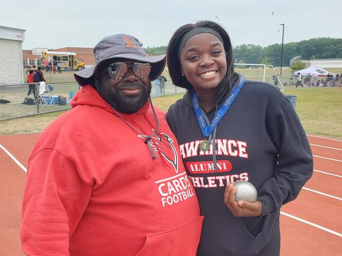 Leticia Kitio and Head BoysThrows Coach Nate Jones.jpg
