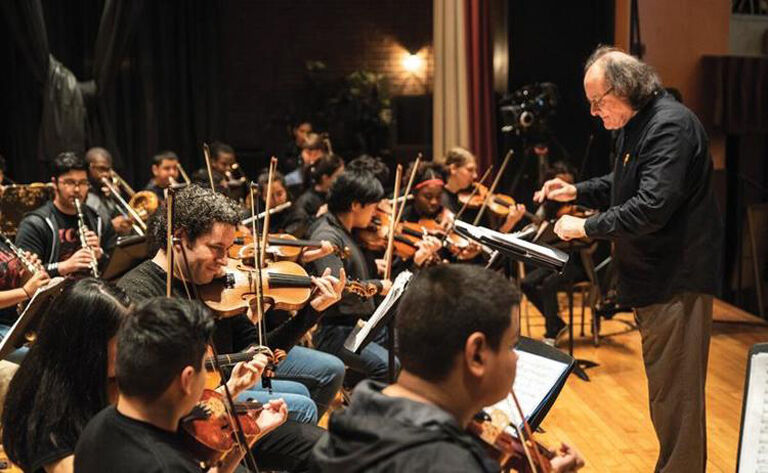 TD Kiosk Puccitti directs while Gustavo Dudamel performs with the TCHS Orchestra - Photo by Nick Donnoli.jpg