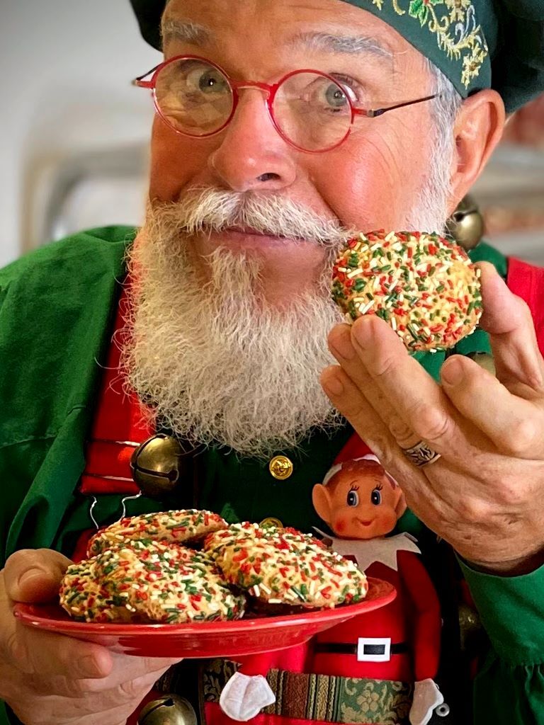 Santa with the NYC Confetti cookies in Christmas Colors - Aunt Cookie.jpg