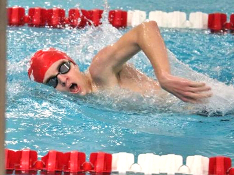 Lawrence High School boys’ swim team hits high points despite low numbers