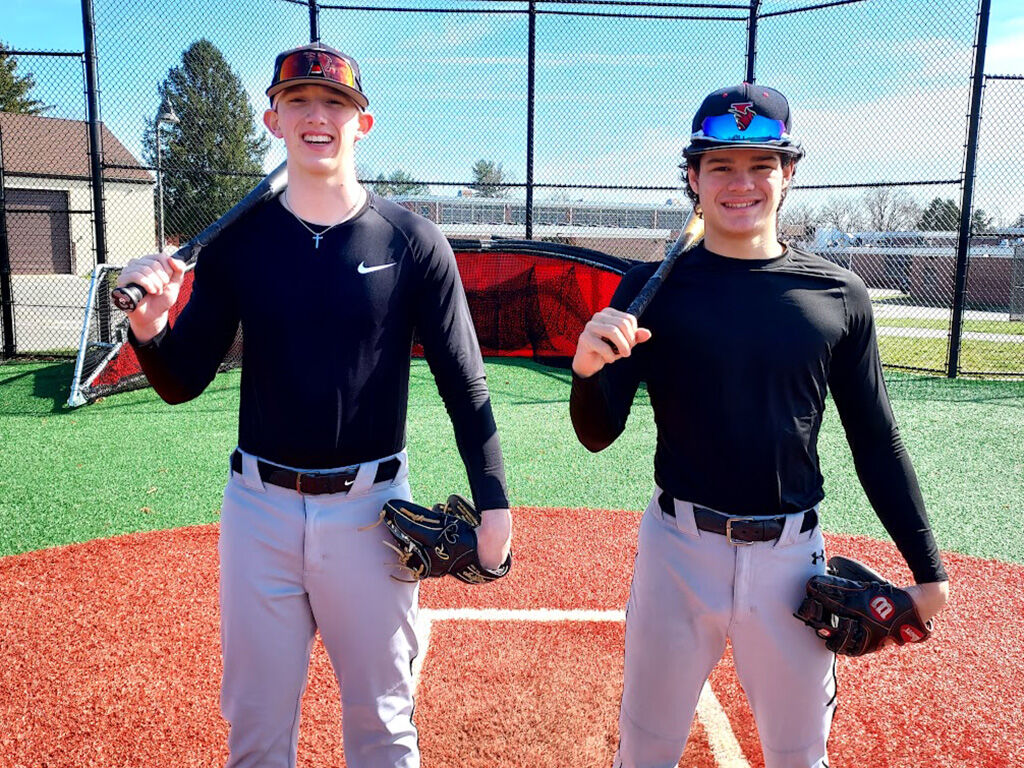 Lawrence High School baseball players Connor Moore (left) and Robert Kelly.