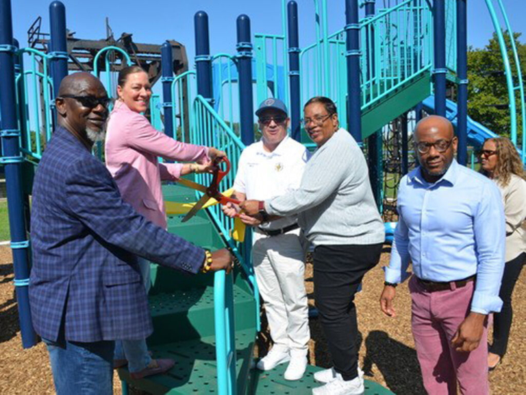 Trenton officials celebrate the grand opening of the Trenton Marine Terminal Playground