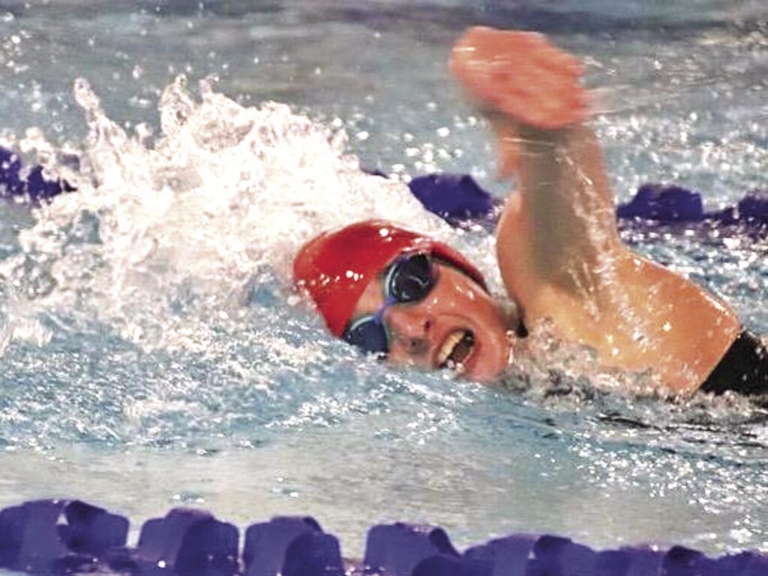 Lawrence’s Zoey Snellings thrives in the pool and classroom