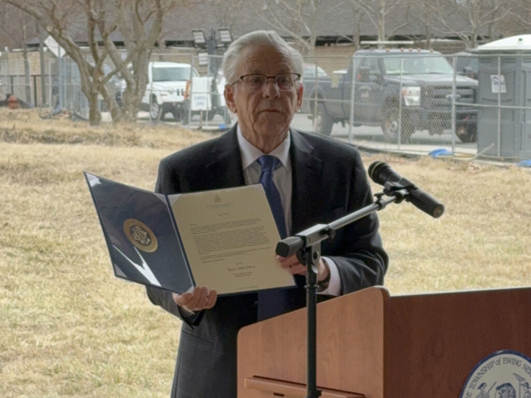 Ewing Mayor Bert Steinmann helps get the ball rolling on new ESCC
