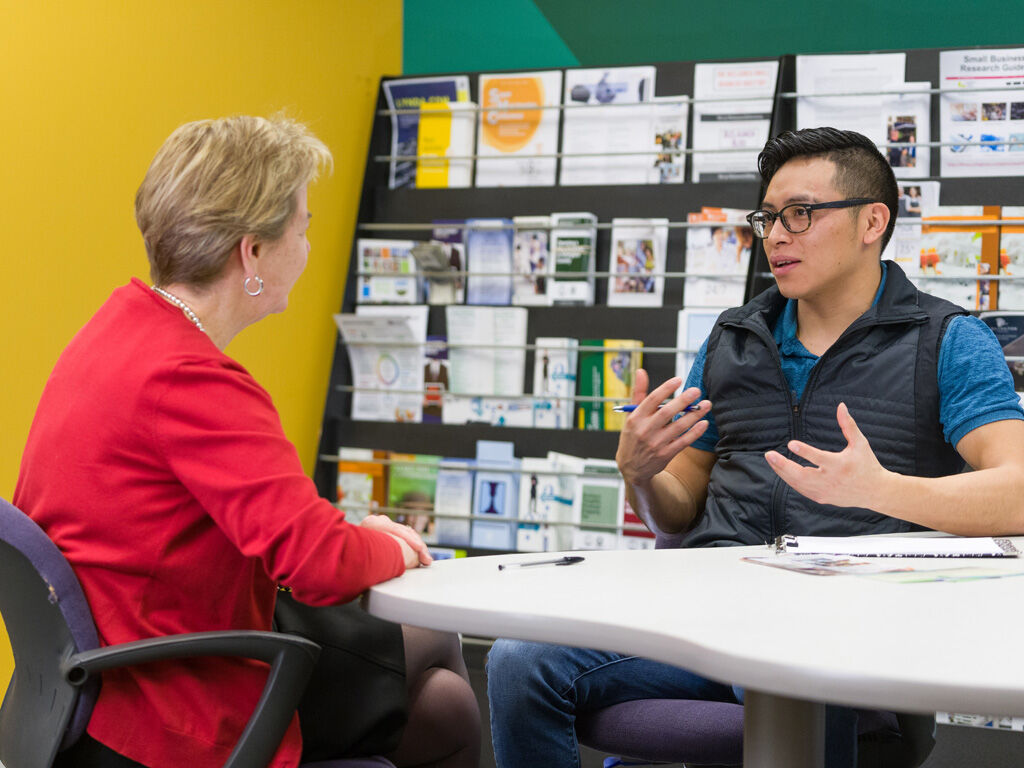 SCORE Mentor with client